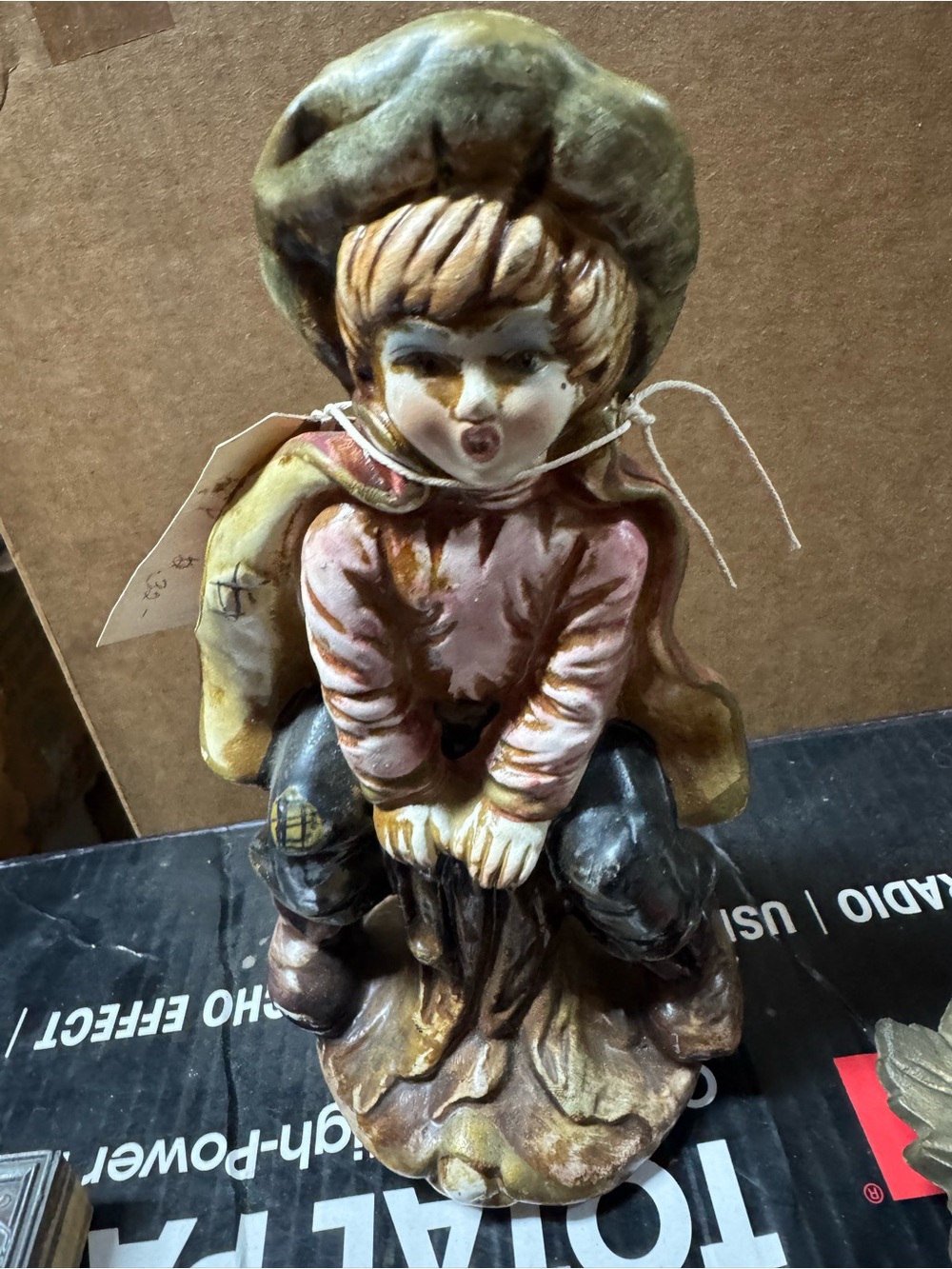 vintage Italian porcelain or ceramic figurine of a young boy On Log (G)